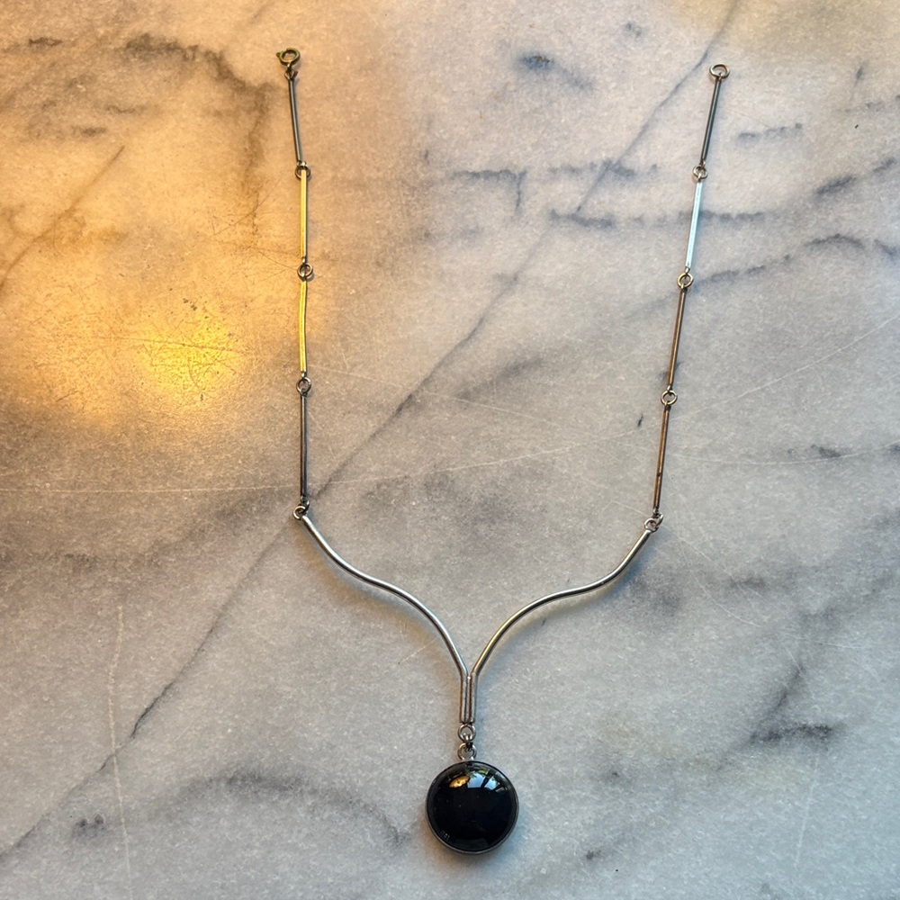 Elegant Silver Necklace with Black Pendant